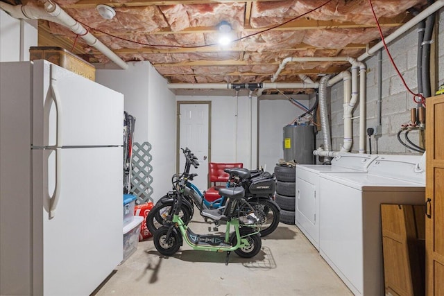 71 Pope Ln, Albrightsville, PA 18210 - unfinished basement featuring freestanding refrigerator, washer and clothes dryer, and electric water heater