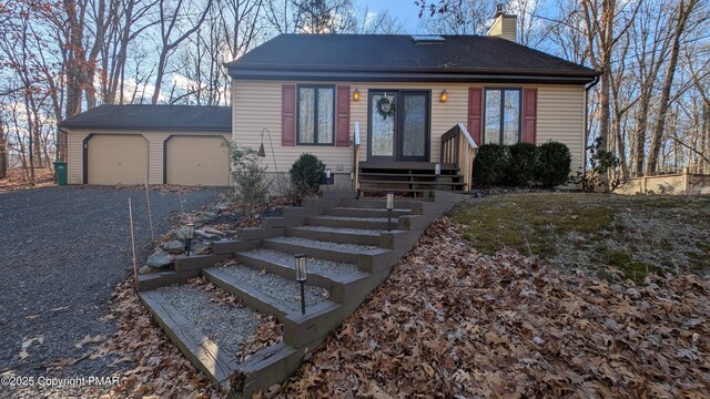 view of front of property with a garage