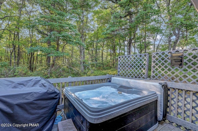 exterior space featuring a hot tub