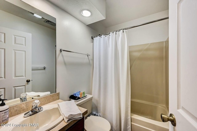 full bathroom featuring toilet, visible vents, shower / bath combo with shower curtain, and vanity