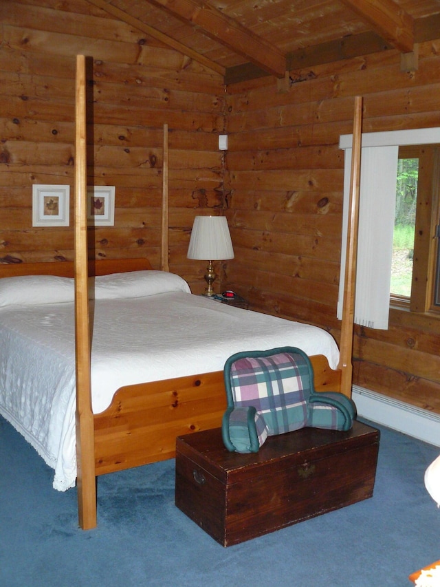 1006 Mill Creek Rd, Newfoundland, PA 18445 - bedroom with carpet flooring, beam ceiling, wood ceiling, wood walls, and a baseboard radiator