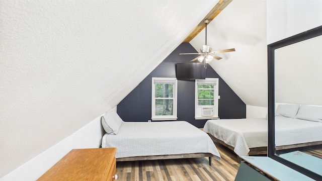 112 Moshannon Dr, Pocono Lake, PA 18347 - bedroom featuring wood finished floors, vaulted ceiling, a textured ceiling, and a ceiling fan