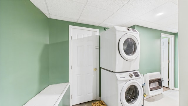112 Moshannon Dr, Pocono Lake, PA 18347 - laundry room with stacked washing machine and dryer and heating unit