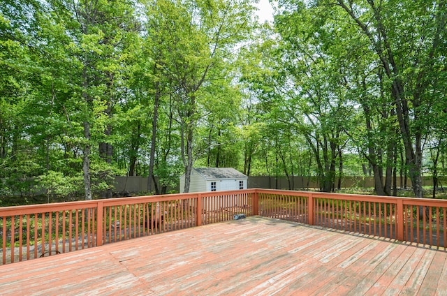 1214 Shadblow Rd, Pocono Summit, PA 18346 - wooden terrace featuring an outbuilding and a fenced backyard