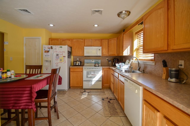 1214 Shadblow Rd, Pocono Summit, PA 18346 - kitchen featuring white appliances, tasteful backsplash, light tile patterned flooring, recessed lighting, and light countertops