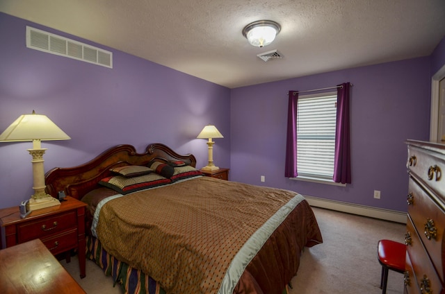 1214 Shadblow Rd, Pocono Summit, PA 18346 - carpeted bedroom with baseboard heating and a textured ceiling