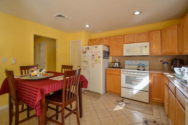 1214 Shadblow Rd, Pocono Summit, PA 18346 - kitchen with white appliances, backsplash, light countertops, recessed lighting, and light tile patterned flooring
