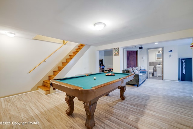 playroom featuring pool table and light wood-style flooring