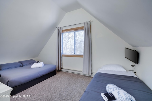 bedroom with carpet floors, baseboard heating, and vaulted ceiling