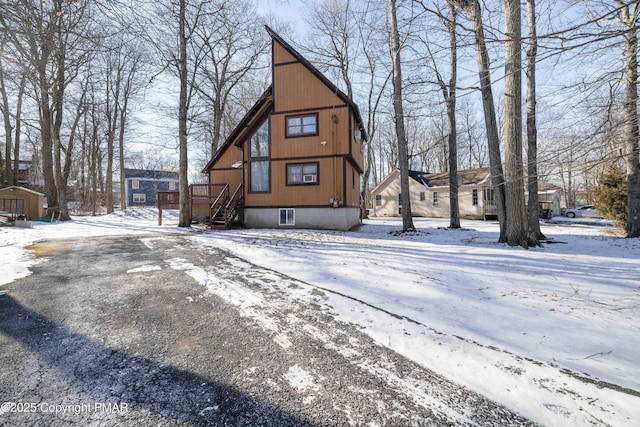 exterior space with an outdoor structure and a shed