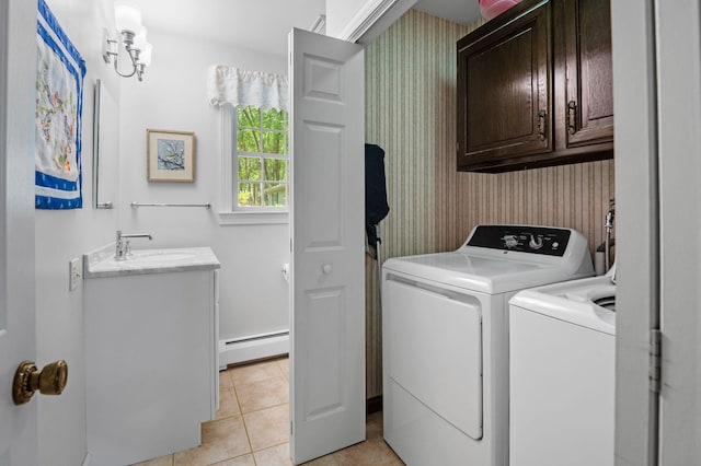 450 Bear Creek Lake Dr, Jim Thorpe, PA 18229 - laundry room with cabinet space, a baseboard radiator, washer and clothes dryer, light tile patterned floors, and wallpapered walls