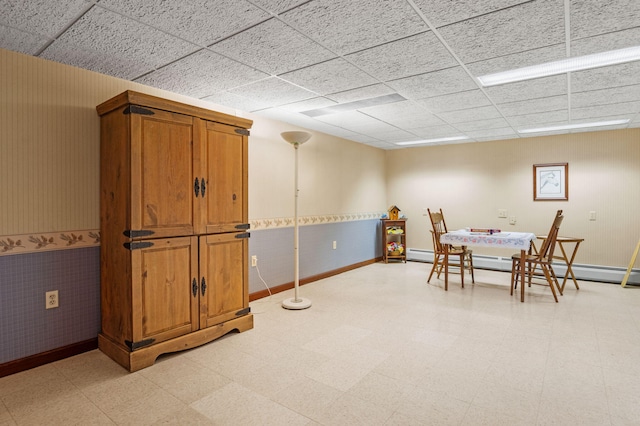450 Bear Creek Lake Dr, Jim Thorpe, PA 18229 - dining space with light floors, a paneled ceiling, and a baseboard heating unit
