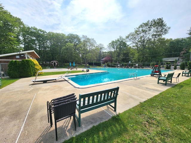 450 Bear Creek Lake Dr, Jim Thorpe, PA 18229 - community pool featuring a patio and view of scattered trees