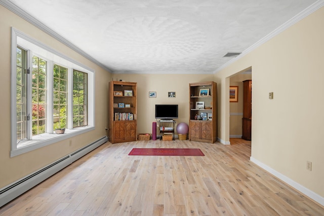 450 Bear Creek Lake Dr, Jim Thorpe, PA 18229 - living room with a baseboard heating unit, light wood-style flooring, and crown molding
