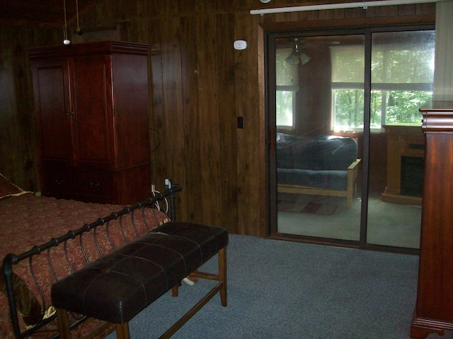 2112 Yorkshire Ct, Bushkill, PA 18324 - carpeted bedroom with wooden walls