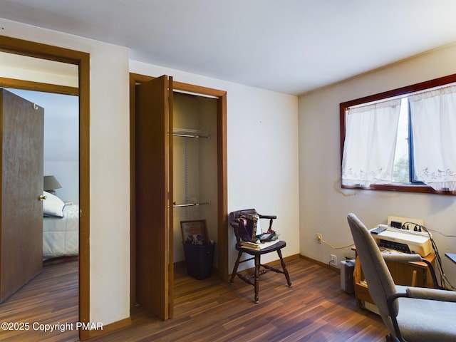 home office featuring baseboards and dark wood-style flooring