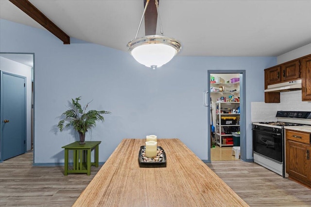 130 Deer Trail Dr, Saylorsburg, PA 18353 - dining area with light wood finished floors and beam ceiling