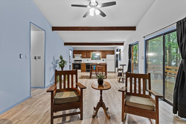 130 Deer Trail Dr, Saylorsburg, PA 18353 - dining area featuring a ceiling fan, light wood-style flooring, and beam ceiling