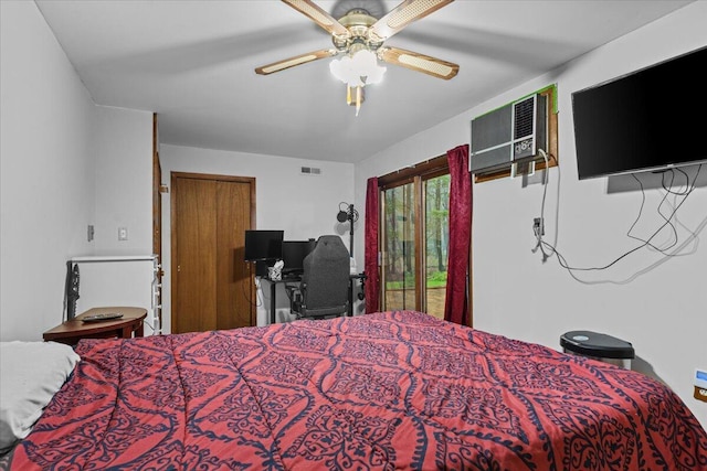 130 Deer Trail Dr, Saylorsburg, PA 18353 - bedroom with access to outside, a wall mounted AC, a ceiling fan, and an office area