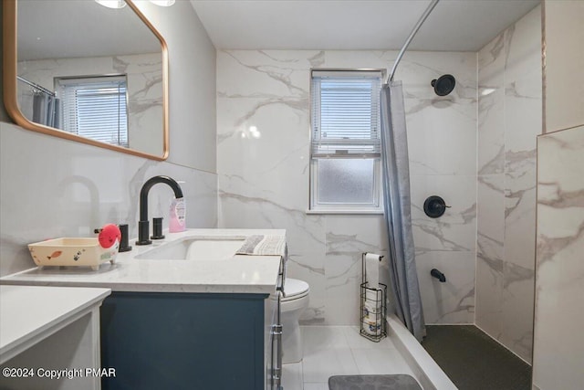 full bath featuring toilet, a shower with shower curtain, vanity, and tile walls