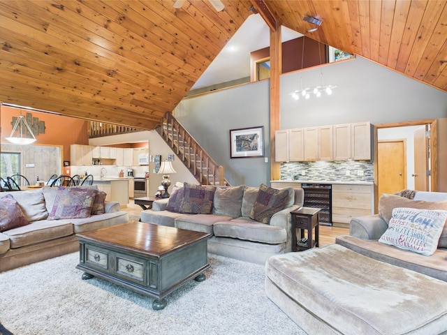 140 Boones Trl, Pocono Pines, PA 18350 - living room with high vaulted ceiling, wine cooler, stairs, and wood ceiling