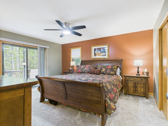 140 Boones Trl, Pocono Pines, PA 18350 - bedroom with light colored carpet, access to exterior, multiple windows, and a ceiling fan