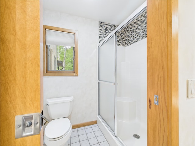 140 Boones Trl, Pocono Pines, PA 18350 - full bathroom featuring a shower stall, tile patterned flooring, toilet, and baseboards