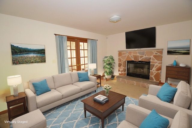 141 Fergus Way, Tobyhanna, PA 18466 - living room with a stone fireplace and french doors