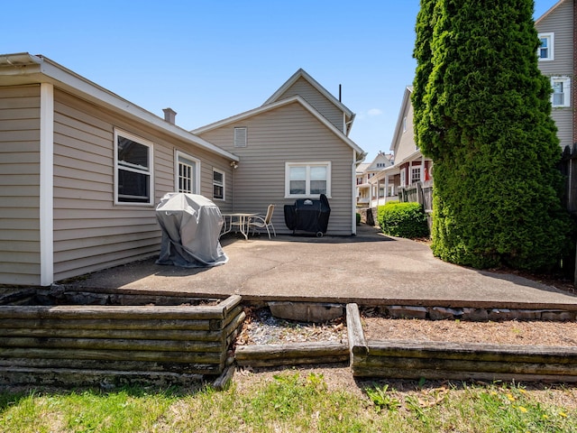 210 N Schanck Ave, Pen Argyl, PA 18072 - rear view of house with a patio area