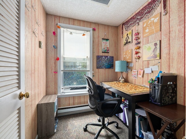 210 N Schanck Ave, Pen Argyl, PA 18072 - office featuring wood walls, a textured ceiling, carpet flooring, and baseboard heating