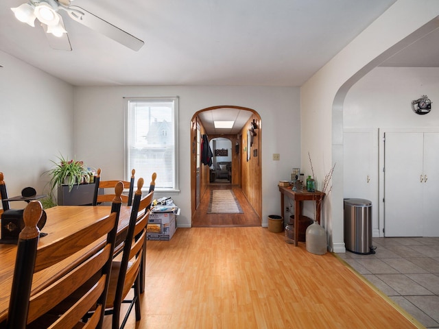 210 N Schanck Ave, Pen Argyl, PA 18072 - dining space with arched walkways, ceiling fan, and light wood-type flooring
