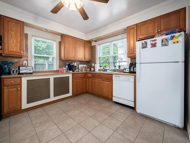 210 N Schanck Ave, Pen Argyl, PA 18072 - kitchen featuring white appliances, a sink, a ceiling fan, crown molding, and healthy amount of natural light