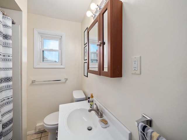 210 N Schanck Ave, Pen Argyl, PA 18072 - bathroom featuring toilet, tile patterned floors, vanity, and curtained shower