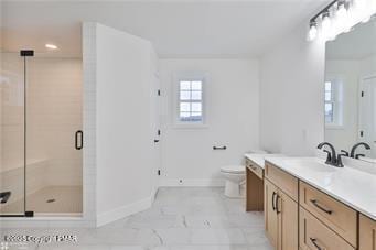 full bath with toilet, vanity, baseboards, marble finish floor, and a shower stall