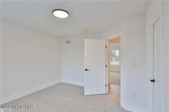 unfurnished bedroom with baseboards