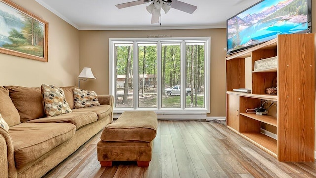 235 White Pine Ln, Pocono Lake, PA 18347 - living room with ceiling fan, ornamental molding, wood-type flooring, and baseboard heating