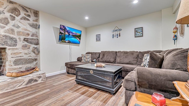 235 White Pine Ln, Pocono Lake, PA 18347 - living room with wood finished floors, baseboards, and recessed lighting