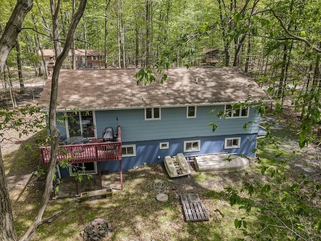 235 White Pine Ln, Pocono Lake, PA 18347 - rear view of house with a wooden deck and a shingled roof