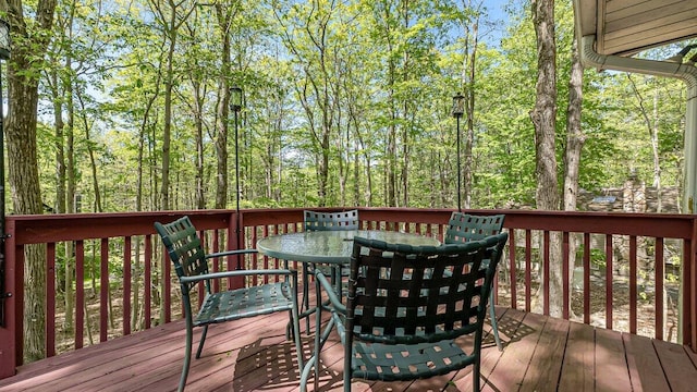 235 White Pine Ln, Pocono Lake, PA 18347 - wooden terrace with outdoor dining area