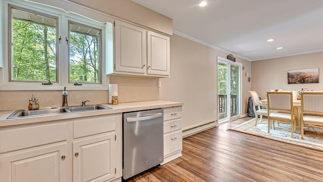 235 White Pine Ln, Pocono Lake, PA 18347 - kitchen with stainless steel dishwasher, a baseboard radiator, a sink, white cabinetry, and light countertops