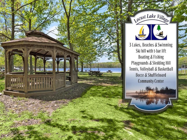 235 White Pine Ln, Pocono Lake, PA 18347 - view of community featuring a gazebo, a water view, and a lawn