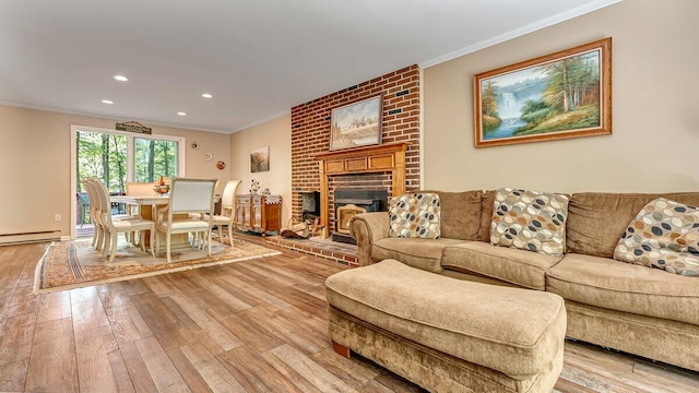 235 White Pine Ln, Pocono Lake, PA 18347 - living area featuring ornamental molding, light wood-style flooring, recessed lighting, a brick fireplace, and baseboard heating