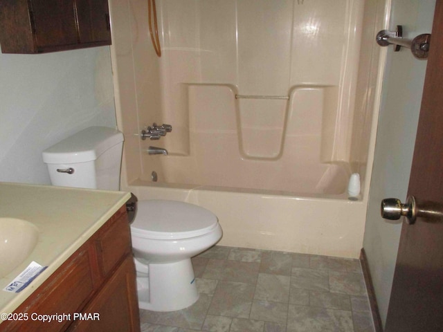 full bathroom with shower / bath combination, vanity, and toilet