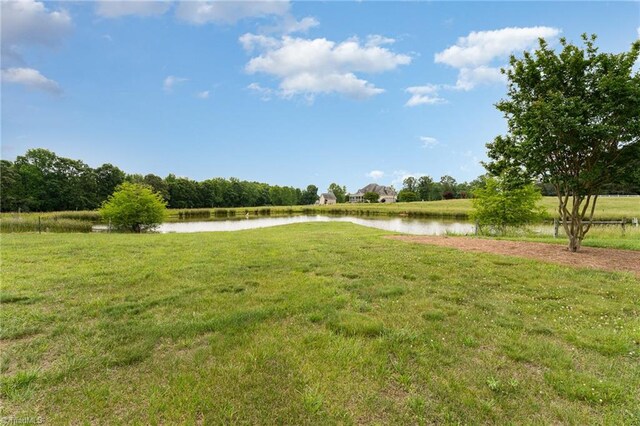 view of yard with a water view