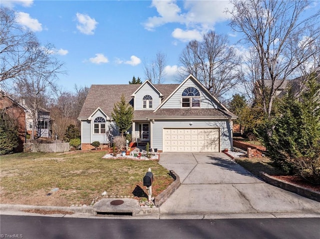 view of front of home with driveway, a garage, a front lawn, and roof with shingles