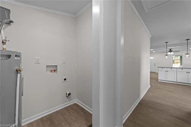 laundry room with crown molding, washer hookup, electric water heater, and hookup for an electric dryer