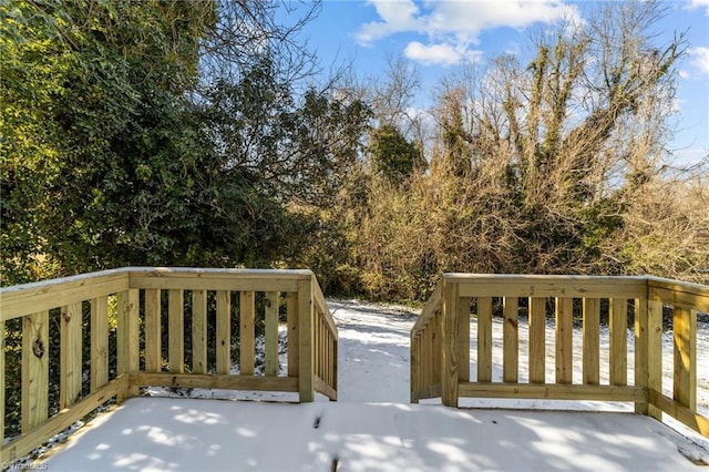 view of snow covered deck