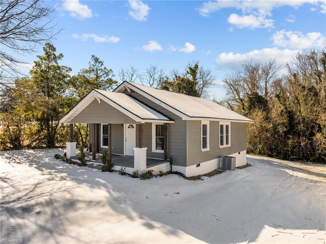 view of front of home with central AC and covered porch