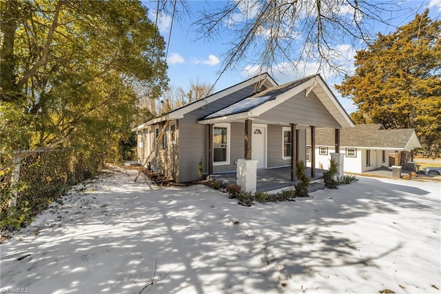 view of front of home featuring covered porch