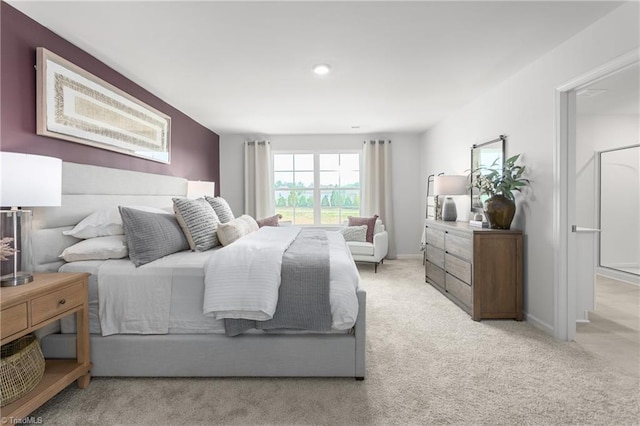 bedroom featuring carpet flooring and baseboards